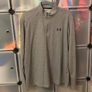 Three Men’s Under Armour zip ups